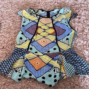 Geometric patterned peplum blouse